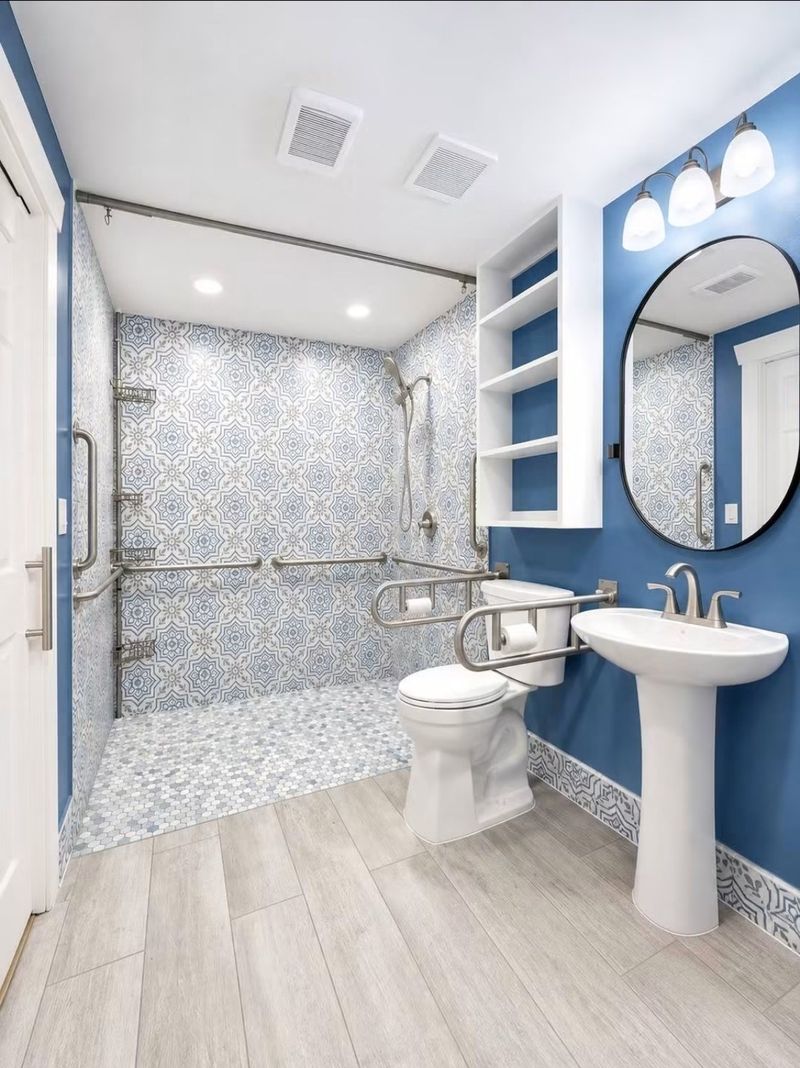 Bathroom with shower, grab bars and sink